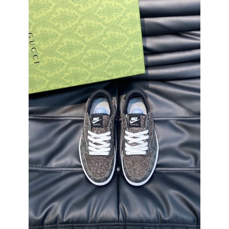 G*u*i sneakers